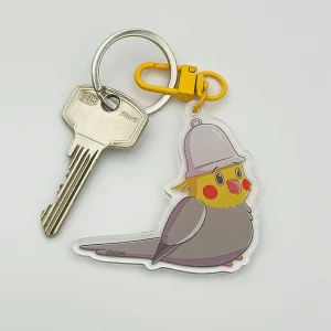 Kiko the cockatiel with a bell hat - Acrylic keychain